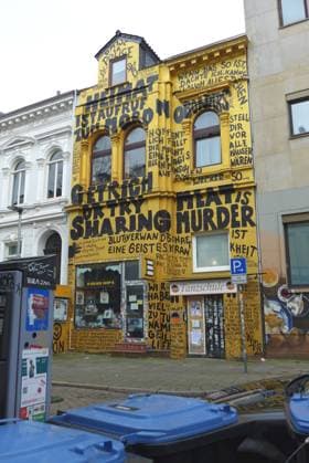 In a side street of Bremens Steintor district stands a residential and commercial building with a completely painted façade Below is the Golden Shop book and record store