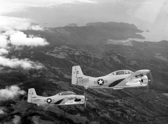 RECORD DATE NOT STATED Vietnam: Two South Vietnamese Air Force North American T-28C Trojan aircraft flying over the Vietnamese coastline during a counterinsurgency training mission in 1962. The Second Indochina War, known in America as the Vietnam War, was a Cold War era military conflict that occurred in Vietnam, Laos, and Cambodia from 1 November 1955 to the fall of Saigon on 30 April 1975. This war followed the First Indochina War and was fought between North Vietnam, supported by its communist allies, and the government of South Vietnam, supported by the U.S. and other anti-communist nations. The U.S. government viewed involvement in the war as a way to prevent a communist takeover of South Vietnam and part of their wider strategy of containment.<br ><br > T Copyright: xxPicturesxFromxHistoryx