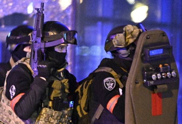 Russia Concert Shooting 8647745 22.03.2024 Law enforcement officers are seen near the Crocus City Hall concert venue following a reported shooting incident, near Moscow, Russia. Several gunmen in combat fatigues burst into a concert hall on March 22 and fired automatic weapons at the crowd, injuring an unspecified number of people. Sergey Bobylev Sputnik Moscow region Russia  Copyright: xSergeyxBobylevx