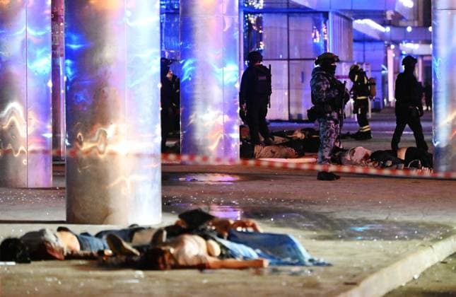 Russia Concert Shooting 8647747 22.03.2024 Bodies of victims are seen near the Crocus City Hall concert venue following a reported shooting incident, near Moscow, Russia. Several gunmen in combat fatigues burst into a concert hall on March 22 and fired automatic weapons at the crowd, injuring an unspecified number of people. Maksim Blinov Sputnik Moscow region Russia  Copyright: xMaksimxBlinovx