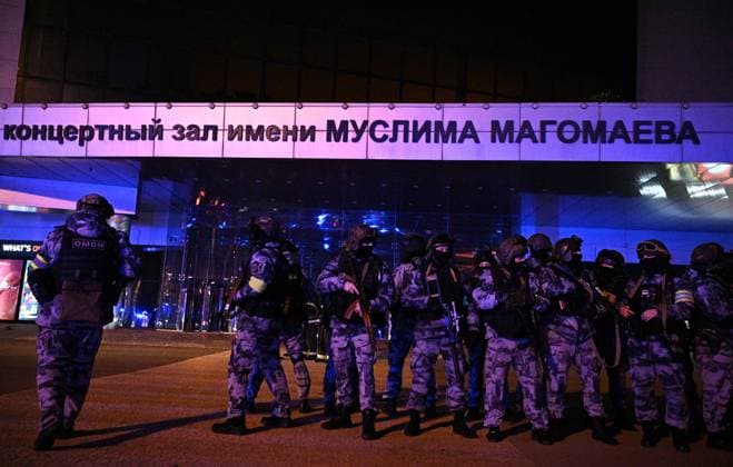Russia Concert Shooting 8647752 22.03.2024 Law enforcement officers are seen near the Crocus City Hall concert venue following a reported shooting incident, near Moscow, Russia. Several gunmen in combat fatigues burst into a concert hall on March 22 and fired automatic weapons at the crowd, injuring an unspecified number of people. Sergey Bobylev Sputnik Moscow region Russia  Copyright: xSergeyxBobylevx
