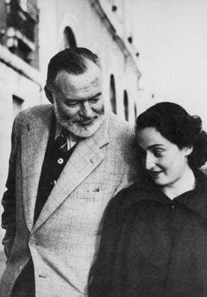 E. HEMINGWAY (1899-1961). American writer. Photographed at Venice with Adriana Ivancich, 1950.  Copyright: xGRANGERx xGRANGERx 0065215