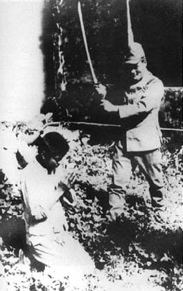 China: Rape of Nanking - Japanese soldier beheading Chinese victim. The Nanking Massacre or Nanjing Massacre, also known as the Rape of Nanking, is a mass murder and war rape that occurred during the six-week period following the Japanese capture of the city of Nanjing (Nanking), the former capital of the Republic of China, on December 13, 1937 during the Second Sino-Japanese War. During this period, hundreds of thousands of Chinese civilians and disarmed soldiers were murdered and 20,000 80,000 women were raped by soldiers of the Imperial Japanese Army. Copyright: xxPicturesxFromxHistoryx