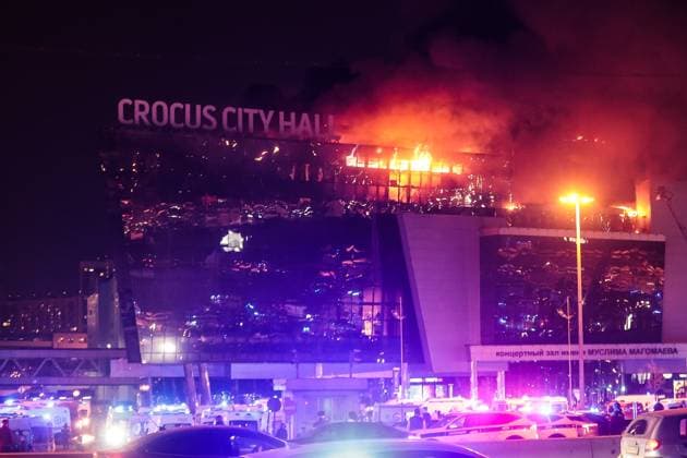 March 22, 2024. Russia, Moscow Region, Krasnogorsk. Smoke rises over the Crocus City Hall in the town of Krasnogorsk where unidentified persons opened fire. Evacuation is underway. DmitryxGolubovich