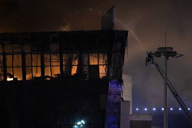 Russia Terrorist Attack 8647869 22.03.2024 Firefighters work to extinguish fire at the burning Crocus City Hall concert venue following a shooting incident, outside Moscow, Russia. The Russian Federal Security Service (FSB) said that there are people dead and injured as a result of the terrorist attack in the concert hall in Moscow region. A massive fire has also broken out at the venue. Alexey Maishev Sputnik Moscow region Russia  Copyright: xAlexeyxMaishevx