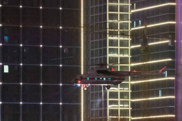 RUSSIA, MOSCOW REGION - MARCH 22, 2024: A helicopter battles a fire at the Crocus City Hall in the town of Krasnogorsk after a mass shooting by several unidentified gunmen. Evacuation is underway. Vladimir Gerdo TASS  68460713
