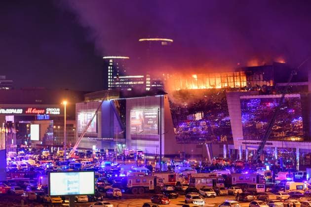 (240322) -- MOSCOW, March 22, 2024 -- Smoke from fire rises above the burning Crocus City Hall concert venue following a shooting incident in the northwest of Moscow, Russia, on March 22, 2024. At least 40 people were killed and more than 100 injured after a shooting at the Crocus City Hall concert venue on Friday, according to preliminary data from the Russian Federal Security Service. ) RUSSIA-MOSCOW-CONCERT VENUE-SHOOTING CaoxYang 