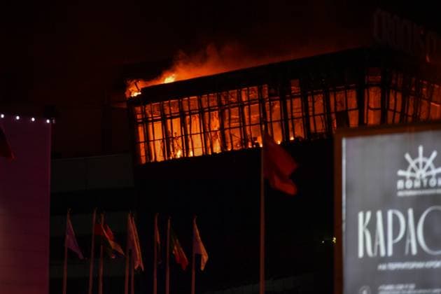 (240322) -- MOSCOW, March 22, 2024 -- Smoke from fire rises above the burning Crocus City Hall concert venue following a shooting incident in the northwest of Moscow, Russia, on March 22, 2024. At least 40 people were killed and more than 100 injured after a shooting at the Crocus City Hall concert venue on Friday, according to preliminary data from the Russian Federal Security Service. ) RUSSIA-MOSCOW-CONCERT VENUE-SHOOTING CaoxYang 