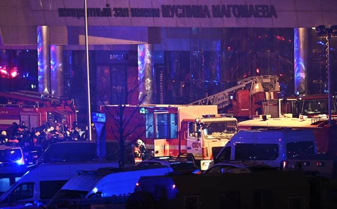 Russia Terrorist Attack 8647932 22.03.2024 Emergency vehicles are seen near the Crocus City Hall concert venue following a reported shooting incident, near Moscow, Russia. The Russian Federal Security Service (FSB) said that there are people dead and injured as a result of the terrorist attack in the concert hall in Moscow region. A massive fire has also broken out at the venue. Sergey Bobylev Sputnik Moscow region Russia  Copyright: xSergeyxBobylevx