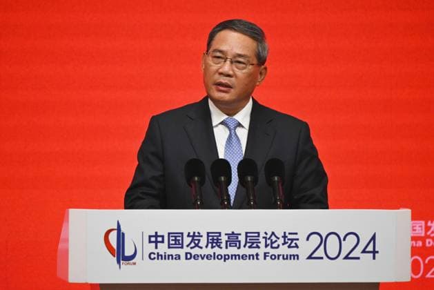 News Themen der Woche KW12 News Bilder des Tages China Premier at development forum Chinese Premier Li Qiang delivers a speech at China Development Forum in Beijing on March 24, 2024. (Pool photo)  A14AA0002630649P