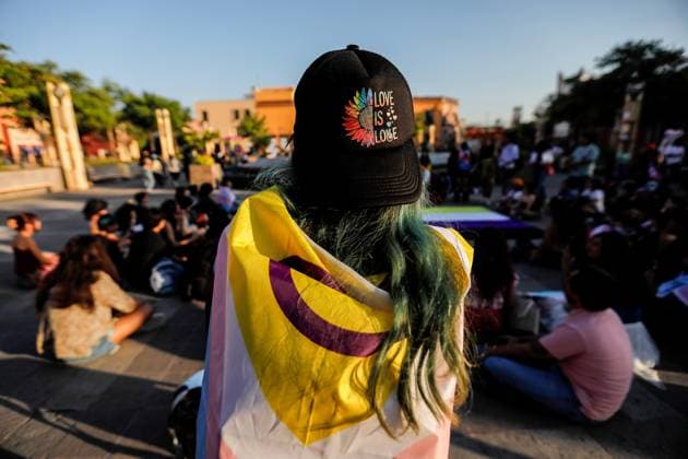 March for Transgender Rights in Queretaro, Mexico - 23 Mar 2024 Protester wears a cap with the legend love is love during the demonstration. The Transsexual Community March took place on the streets of downtown Queretaro intending to make this sector of society visible. One of the slogans is that the Gender Law, which has been in Congress since last year, be approved and that security and anti-discrimination guarantees be given in Querétaro. Queretaro Mexico Copyright: xCesarxGomezx xSOPAxImagesx _EGR1244