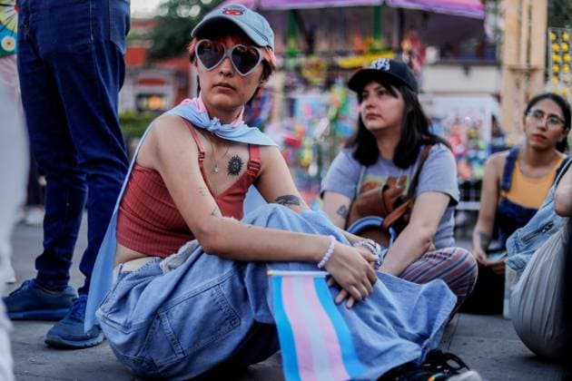 March for Transgender Rights in Queretaro, Mexico - 23 Mar 2024 Protester holds a flag with the colors of the transsexual movement during the demonstration. The Transsexual Community March took place on the streets of downtown Queretaro intending to make this sector of society visible. One of the slogans is that the Gender Law, which has been in Congress since last year, be approved and that security and anti-discrimination guarantees be given in Querétaro. Queretaro Mexico Copyright: xCesarxGomezx xSOPAxImagesx _EGR1271