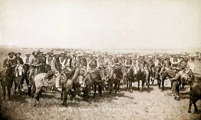 WYOMING: COWBOYS, c1883. Group of cowboys in Cheyenne, Wyoming. Photograph by Charles D. Kirkland, c1883.  Copyright: xGRANGERx xGRANGERx 0107492