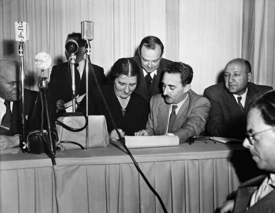 ISRAELI INDEPENDENCE, 1948. The signing of the Israeli Declaration of Independence at the Tel Aviv Museum, 14 May 1948. Seated in front are Golda Meir and Moshe Sharett.  Copyright: xGRANGERx xGRANGERx 0115397