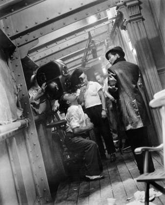 KATHARINE HEPBURN (1907-2003). American actress. Hepburn, right, disguised as a young man, being filmed in closeup for Sylvia Scarlett, directed by George Cukor, 1936  Copyright: xGRANGERx xGRANGERx 0122816