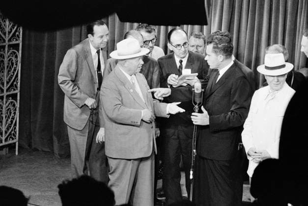 NIXON AND KHRUSHCHEV, 1959. U.S. Vice President Richard Nixon (right, at microphone) debating Soviet Premier Nikita Khrushchev on the respective merits of capitalism and communism in the television studio of the American National Exhibition in Moscow, part of their so-called kitchen debate, 24 July 1959. Photographed by Thomas J. O Halloran.  Copyright: xGRANGERx xGRANGERx 0126398