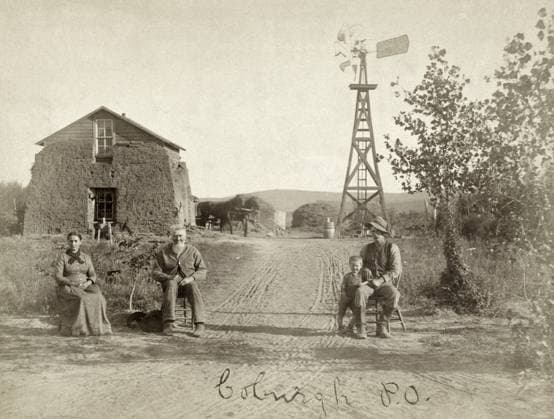 NEBRASKA: SETTLERS, c1889. Family of homesteaders, photographed outside of their sod house at Old Coburgh Post Office, Custer County, Nebraska. Photograph by Solomon D. Butcher, c1889.  Copyright: xGRANGERx xGRANGERx 0130677