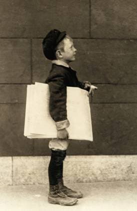 ST. LOUIS: NEWSBOY, 1910. A five-year old newboy selling newspapers in St. Louis, Missouri. Photograph by Lewis Hine, May 1910.  Copyright: xGRANGERx xGRANGERx 0131831