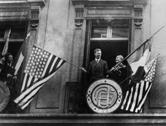 CHARLES A. LINDBERGH (1902-1974). American aviator. Lindbergh waving the American and French flags from the balcony of the Aero Club de France in Paris, following his historic transatlantic solo flight of 20-21 May 1927.  Copyright: xGRANGERx xGRANGERx 0169708