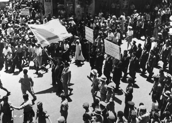 ZIONIST PROTEST, 1939. A Zionist demonstration in May 1939, protesting the British decision to create an independent Palestine and limit the number of Jewish immigrants.  Copyright: xGRANGERx xGRANGERx 0170248