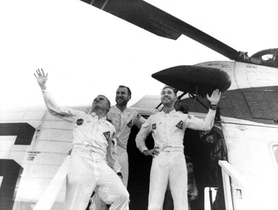 APOLLO 8, 1968. Astronauts Frank Borman, James Lovell Jr. and William Anders waving from the door of a helicopter after their Apollo 8 mission. Photograph, December 1968.  Copyright: xGRANGERx xGRANGERx 0184184