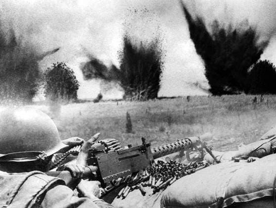 Vietnam: U.S. Air Force bombs create a curtain of flying shrapnel and debris barely 200 feet beyond the perimeter of Khe Sanh during the siege of the U.S. Marine base, March 1968. Photo by Nguyen Ngoc Hang (ARVN) (CC BY-SA 3.0 License) Khe Sanh is the district capital of HÆ°á»›ng Hoa District, Quáº£ng Trá»‹ Province, Vietnam, located 63 km west of ÄÃ ng HÃ .<br ><br > Khe Sanh Combat Base was a United States Marine Corps outpost in South Vietnam (MGRS 48QXD850418) used during the Vietnam War. The airstrip was built in September 1962. Fighting began there in late April of 1967 known as the Hill Fights , which later expanded into the 1968 Battle of Khe Sanh. U.S. commanders hoped that the North Vietnamese Army would attempt to repeat thei Copyright: xNguyenxNgocxHangx(ARVN)x(CCxBY-SxPicturesxFromxHistoryx