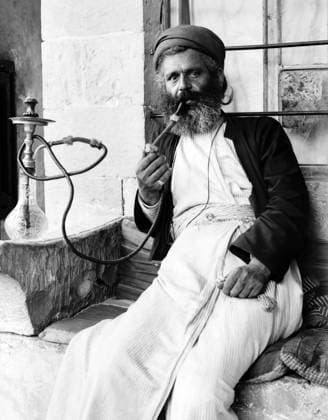 Palestine: A Samaritan man smoking a nargileh (hookah or water pipe), Nablus, c. 1920 Palestine (Arabic: ÙÙ Ø³Ø·ÙäÙÜŽ Filasá¹­Ä«n, Falasá¹­Ä«n, Filisá¹­Ä«n; Greek: Î Î±Î»Î±Î¹ÏƒÏ Î¯Î½Î·, PalaistinÄ ; Latin: Palaestina; Hebrew: ×¤×œ× ×ª×™× × Palestina) is a n ame given to the geographic region between the Mediterranean Sea and the Jordan River. The region is also known as the Land of Israel (Hebrew: ××¨×¥Ö¾×™× ×¨××œ Eretz-Yisra el), the Holy Land and the Southern Levant.<br ><br > In 1832 Palestine was conquered by Muhammad Ali s Egypt, but in 1840 Britain intervened and returned control of the Levant to the Ottomans in return for further capitulations. The end of the 19th century saw the beginning of Zionist immigration and the Reviva Copyright: xxPicturesxFromxHistoryx