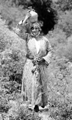 Palestine: A young Palestinian woman posing with a water bottle on her head, Nazareth, c. 1910 Palestine (Arabic: ÙÙ Ø³Ø·ÙäÙÜŽ Filasá¹­Ä«n, Falasá¹­Ä«n, Filisá¹­Ä«n; Greek: Î Î±Î»Î±Î¹ÏƒÏ Î¯Î½Î·, PalaistinÄ ; Latin: Palaestina; Hebrew: ×¤×œ× ×ª×™× × Palestina) is a n ame given to the geographic region between the Mediterranean Sea and the Jordan River. The region is also known as the Land of Israel (Hebrew: ××¨×¥Ö¾×™× ×¨××œ Eretz-Yisra el), the Holy Land and the Southern Levant.<br ><br > In 1832 Palestine was conquered by Muhammad Ali s Egypt, but in 1840 Britain intervened and returned control of the Levant to the Ottomans in return for further capitulations. The end of the 19th century saw the beginning of Zionist immigration and t Copyright: xxPicturesxFromxHistoryx