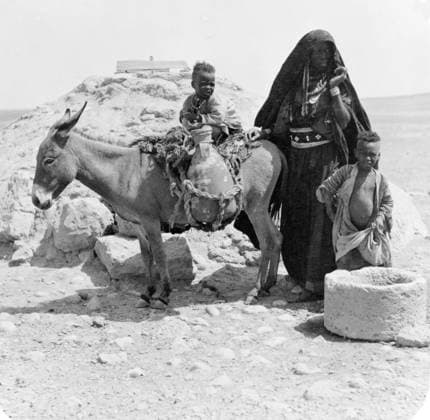 Palestine: A Bedouin woman of African origin with two children and a donkey, Al-Naqab Negev Desert, c. 1910 Palestine (Arabic: ÙÙ Ø³Ø·ÙäÙÜŽ Filasá¹­Ä«n, Falasá¹­Ä«n, Filisá¹­Ä«n; Greek: Î Î±Î»Î±Î¹ÏƒÏ Î¯Î½Î·, PalaistinÄ ; Latin: Palaestina; Hebrew: ×¤×œ× ×ª×™× × Palestina) is a n ame given to the geographic region between the Mediterranean Sea and the Jordan River. The region is also known as the Land of Israel (Hebrew: ××¨×¥Ö¾×™× ×¨××œ Eretz-Yisra el), the Holy Land and the Southern Levant.<br ><br > In 1832 Palestine was conquered by Muhammad Ali s Egypt, but in 1840 Britain intervened and returned control of the Levant to the Ottomans in return for further capitulations. The end of the 19th century saw the beginning of Zionist im Copyright: xxPicturesxFromxHistoryx