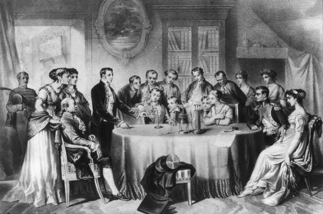 COUNT ALESSANDRO VOLTA (1745-1827). Italian physicist. Volta demonstrating his electric battery before First Consul Napoleon Bonaparte (right), at the Institut de France in Paris, November 1801. Lithograph, 19th century, after a painting by François Constant Mès.  Copyright: xGRANGERx xGRANGERx 0353609