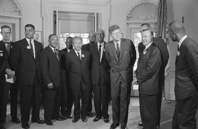 MARCH ON WASHINGTON, 1963. President John F. Kennedy meeting with civil rights leaders following the March on Washington. Left to right: Mathew Ahmann, Whitney Young, Martin Luther King Jr., John Lewis, Rabbi Joachim Prinz, Reverend Eugene Carson Blake, A. Philip Randolph, Walter Reuther, Lyndon Johnson, and Roy Wilkins. Photograph, 28 August 1963.  Copyright: xGRANGERx xGRANGERx 0527232