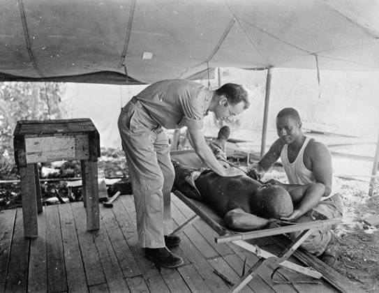 WWII: NEW GUINEA, 1943. American soldiers at a field medical dispensary in New Guinea during World War II. Photograph, 1943.  Copyright: xGRANGERx xGRANGERx 0527322