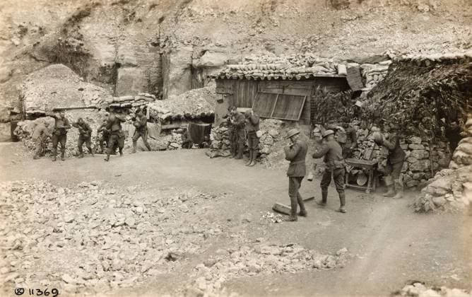 WWI: GAS ALARM, 1918. Men of the 6th Marine Regiment responding to a gas alarm at Verdun, France. Photograph, 30 April 1918.  Copyright: xGRANGERx xGRANGERx 0528993