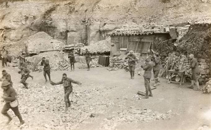 WWI: GAS ALARM, 1918. Men of the 6th Marine Regiment responding to a gas alarm at Verdun, France. Photograph, 30 April 1918.  Copyright: xGRANGERx xGRANGERx 0528994