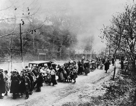 SPANISH CIVIL WAR, 1939. French mobile guards in Le Perthus, France, stop a line of refugees fleeing from Spain after the fall of Barcelona during Spanish Civil War. Photograph, 1939.  Copyright: xGRANGERx xGRANGERx 0635830