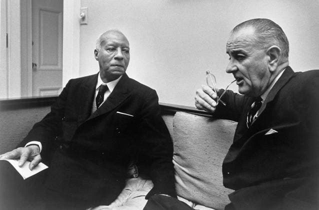 RANDOLPH AND JOHNSON, c1966. American civil rights and labor leader Asa Philip Randolph, seated with President Lyndon Johnson. Photograph, c1966.  Copyright: xGRANGERx xGRANGERx 0636642