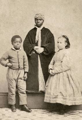SLAVES, c1863. Isaaw White, Mary Johnson, and Augusta Boujey, slaves freed in New Orleans, Louisiana. Photograph by M.H. Kimball, c1863.  Copyright: xGRANGERx xGRANGERx 0636789