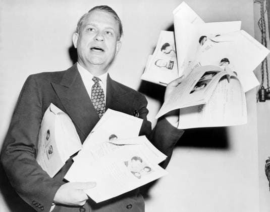 MARTIN DIES, JR. (1900-1972). American politician and Texas congressman. Dies exhibiting photos and reportedly criminal records of CIO officials. Photograph, 1941.  Copyright: xGRANGERx xGRANGERx 0644527