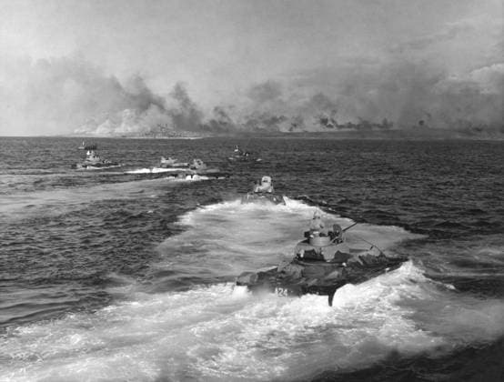 WWII: IWO JIMA, 1945. Track landing vehicles bearing Marines towards the beaches of Iwo Jima. Photograph from the United States Marine Corps, February 1945.  Copyright: xGRANGERx xGRANGERx 0644926