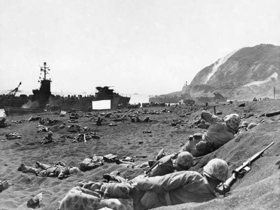 WWII: IWO JIMA, 1945. American Marines disembarking from landing craft onto a beach during the Battle of Iwo Jima. Photograph from the United States Marine Corps, February 1945.  Copyright: xGRANGERx xGRANGERx 0644940