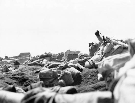 WWII: IWO JIMA, 1945. American Marines under fire on a beach landing site during the Battle of Iwo Jima. Photograph from the United States Marine Corps, February 1945.  Copyright: xGRANGERx xGRANGERx 0644942