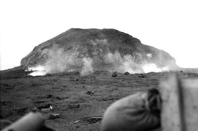 WWII: IWO JIMA, 1945. Mount Suribachi during the Battle of Iwo Jima, viewed from a United States marine field gun emplacement. Photograph by Karl Thayer Soule, February 1945.  Copyright: xGRANGERx xGRANGERx 0651448