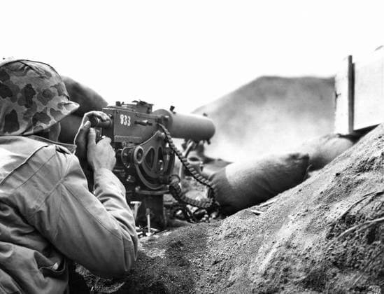 WWII: IWO JIMA, 1945. United States marine firing a machine gun during the Battle of Iwo Jima. Photograph by Karl Thayer Soule, 1945.  Copyright: xGRANGERx xGRANGERx 0651514