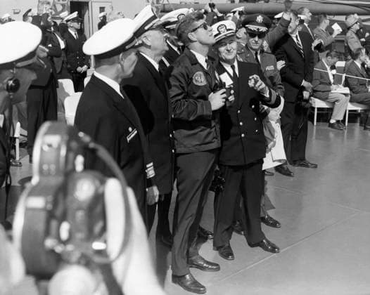 MISSILE LAUNCH, 1963. President John F. Kennedy on board the USS Observation Island viewing the Polaris Missile launch from the USS Andrew Jackson off the coast of Florida. Photograph, 16 November 1963.  Copyright: xGRANGERx xGRANGERx 0908919