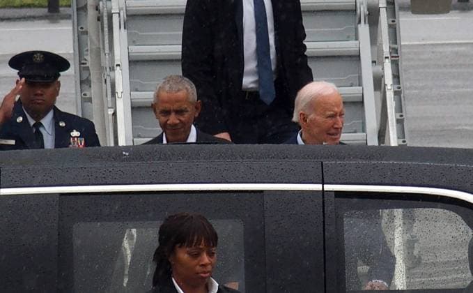 March 28, 2024, New York, New York, USA: President JOE BIDEN, 81, arrives on a rain soaked day at John F. Kennedy Airport on Air Force One to attend a sold out super ritz political fundraiser at Radio City Music Hall that will make him $ 25 million dollars. Also in attendance are former President BARACK OBAMA who arrived on Air Force 1 with President Biden. New York USA - ZUMAct2_ 20240328_faf_ct2_028 Copyright: xBrucexCotlerx