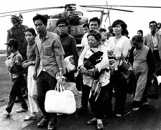 Vietnam: Vietnamese refugees evacuated by helicopter arriving aboard the USS Midway, Fall of Saigon, 29 April 1975 The Fall of Saigon was the capture of Saigon, the capital of South Vietnam, by the People s Army of Vietnam and the National Liberation Front of South Vietnam (also known as the Viet Cong) on April 30, 1975. The event marked the end of the Vietnam War and the start of a transition period leading to the formal reunification of Vietnam into a Socialist Republic governed by the Communist Party.<br ><br > North Vietnamese forces under the command of the General Van Tien Dung began their final attack on Saigon, with South Vietnamese forces commanded by General Nguyen Van Toan, on April 29, suffering heavy artillery bombardment. By Copyright: xxPicturesxFromxHistoryx