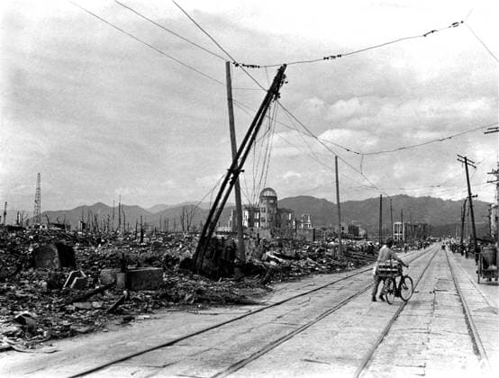Japan: A Japanese man with a bicycle walks through the ruins of Hiroshima following the dropping of the world s first atomic bomb on the city on 6 August 1945 On Monday, August 6, 1945, at 8:15 am, the nuclear bomb Little Boy was dropped on Hiroshima by an American B-29 bomber, the Enola Gay, directly killing an estimated 80,000 people.<br ><br > By the end of the year, injury and radiation brought the total number of deaths to 90,000 166,000. The population before the bombing was around 340,000 to 350,000. Approximately 70% of the city s buildings were destroyed, and another 7% severely damaged. Copyright: xxPicturesxFromxHistoryx