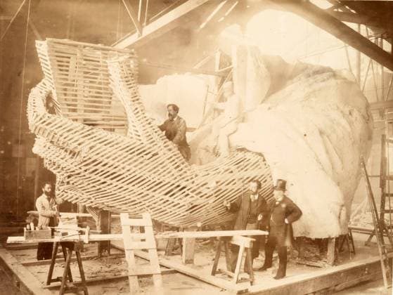 Construction of the skeleton and plaster surface for the left arm and hand of the Statue of Liberty, c.1880 (albumen print) 1154235 Construction of the skeleton and plaster surface for the left arm and hand of the Statue of Liberty, c.1880 (albumen print) by Fernique, Albert (d.1898); New York Public Library, USA; (add.info.: The statue, designed by FrÃ dÃ ric Auguste Bartholdi and dedicated on October 28, 1886, was a gift to the United States from the people of France.). Copyright: xBridgemanxImagesx 1154235