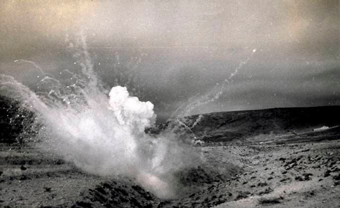 Explosion of an incendiary bomb during a drill in the territory of Teruel on July 15, 1939, during a Spanish civil war action known as Del Levante . Smoke, gas and rubble that resulted from the violent reaction of the bomb can be seen (b w photo) 1250035 Explosion of an incendiary bomb during a drill in the territory of Teruel on July 15, 1939, during a Spanish civil war action known as Del Levante . Smoke, gas and rubble that resulted from the violent reaction of the bomb can be seen (b w photo) by Unknown photographer, (20th century); (add.info.: Unidentified Author Spain); Fratelli Alinari Museum Collections, Florence, Italy. Copyright: xFratellixAlinarixMuseumxCollections,xFlorence,xItalyx xBridgemanxImagesx 1250035