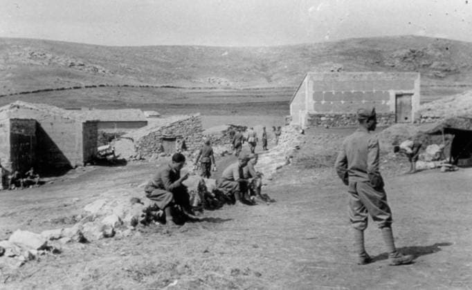 Italian soldiers of the Third Company photographed resting during their temporary lodgings in farm buildings in the course of the Spanish civil war, 07 1938 (b w photo) 1250079 Italian soldiers of the Third Company photographed resting during their temporary lodgings in farm buildings in the course of the Spanish civil war, 07 1938 (b w photo) by Unknown photographer, (20th century); (add.info.: Unidentified Author Spain); Fratelli Alinari Museum Collections, Florence, Italy. Copyright: xFratellixAlinarixMuseumxCollections,xFlorence,xItalyx xBridgemanxImagesx 1250079